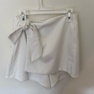 white skort with tie in front